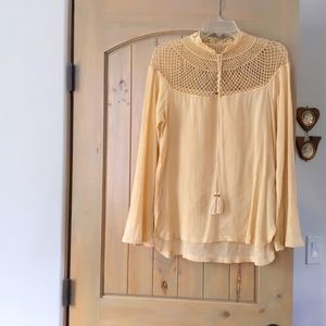 Free People long sleeved light gold woman's blouse in Medium.